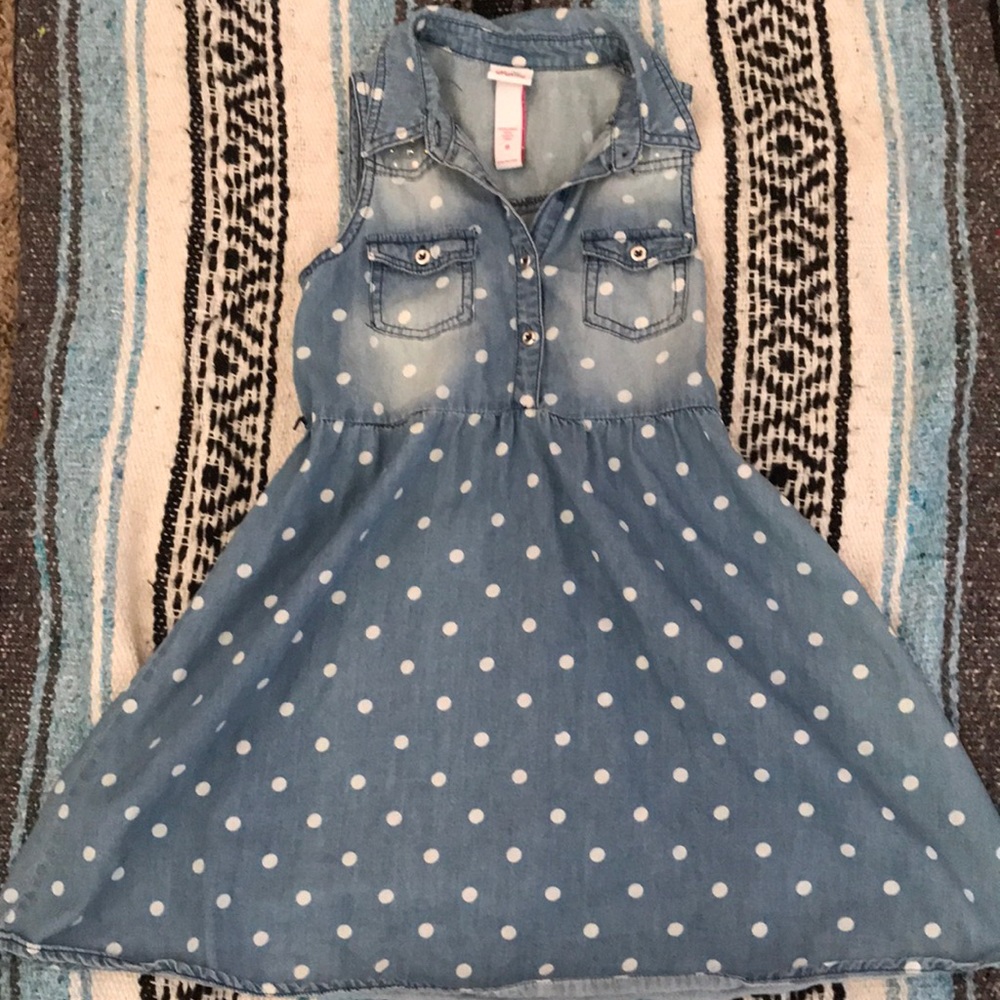 Kid’s white polka dot jean dress.
